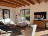 Chalet Presseggersee comfortable living room with corner sofa, dining table for 10, smart TV and wood stove